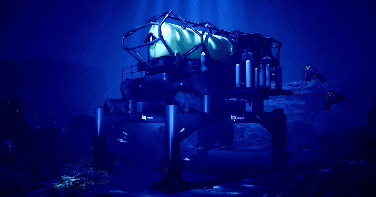 Underwater cylindrical habitat anchored to ocean floor with support buoy on surface above