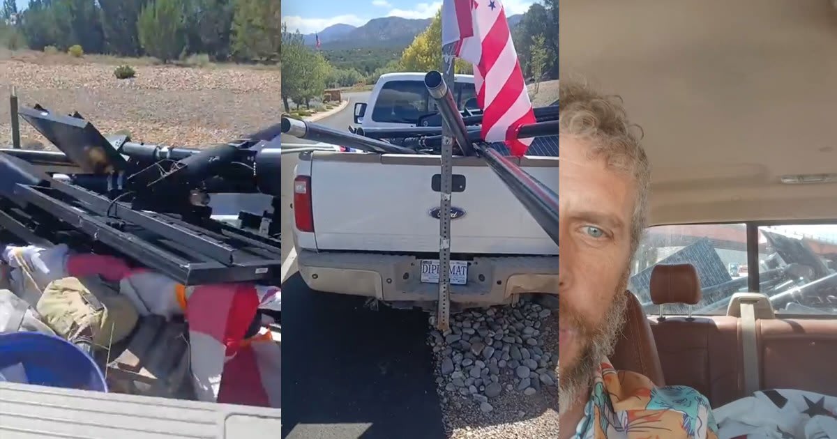 Pickup truck loaded with dismantled surveillance camera tower parts in Albuquerque, New Mexico