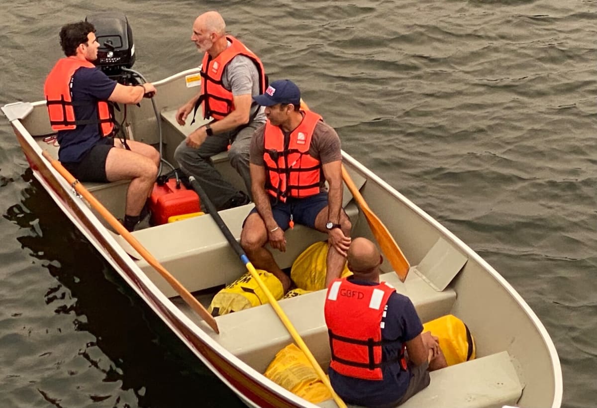 Golden's Bridge firefighters aboard Marine 25 rescue boat conducting water safety training exercises