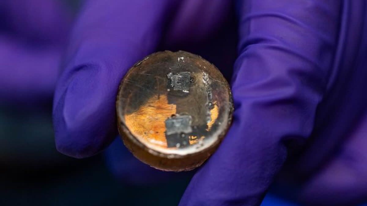 Chemical mixture in glass vial being prepared in laboratory to simulate Mercury rock formation