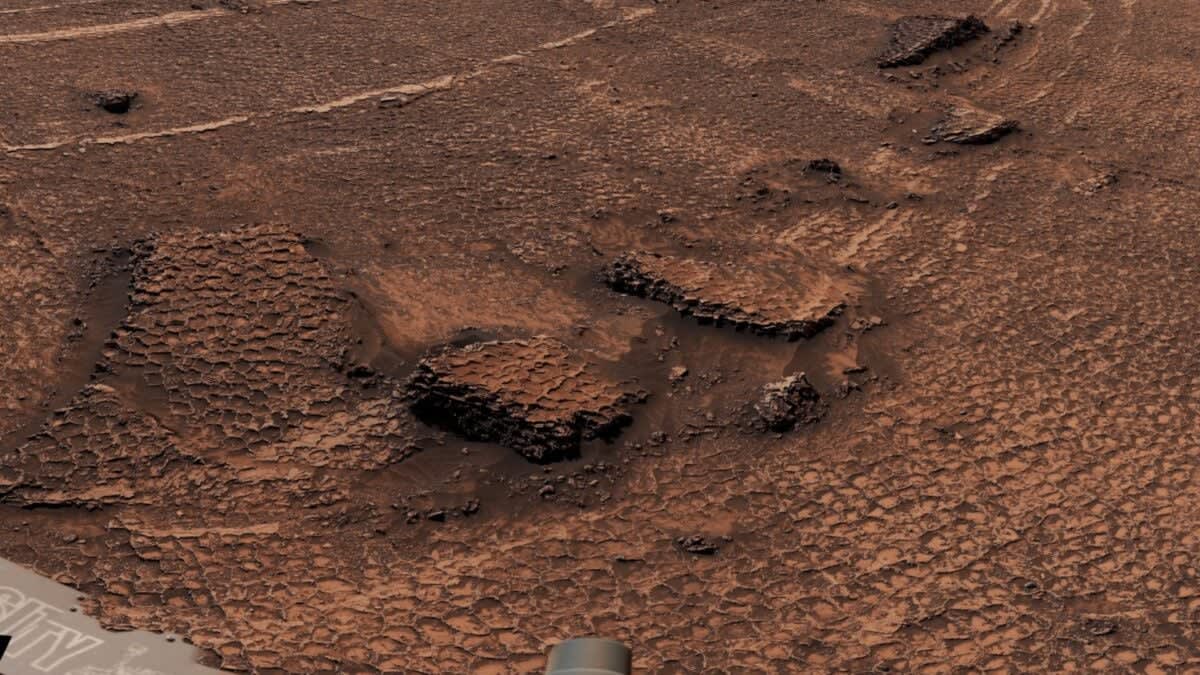 Panoramic view of honeycomb-patterned Martian surface captured by NASA's Curiosity rover in Valle Grande