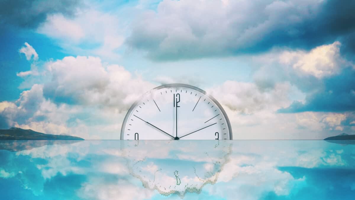 ** Guido Tonelli's book cover showing "Time: The Dream of Killing Chronos" title with cosmic imagery