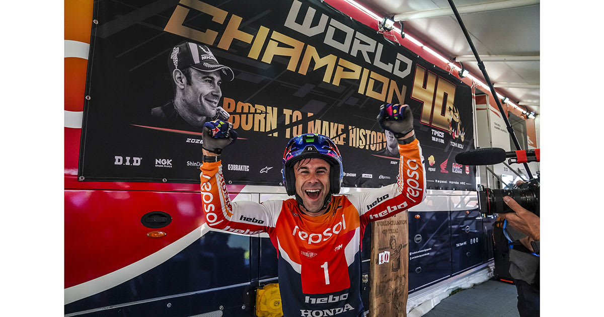 Toni Bou riding his red Honda Montesa trial motorcycle through challenging terrain