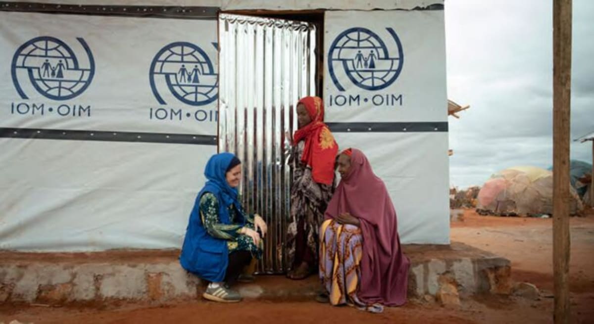 UN International Organization for Migration worker providing support and assistance to people in need