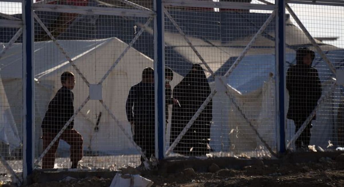 Displaced persons at Syrian camp awaiting support from UN humanitarian assistance programs