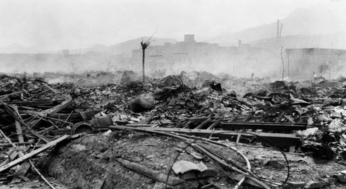 Young Japanese woman Suzuka Nakamura holding papers during peace activism work in Nagasaki