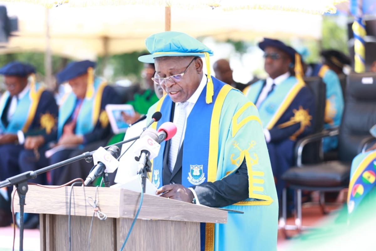 Maritime university graduates in caps and gowns celebrating at outdoor ceremony in Accra Ghana