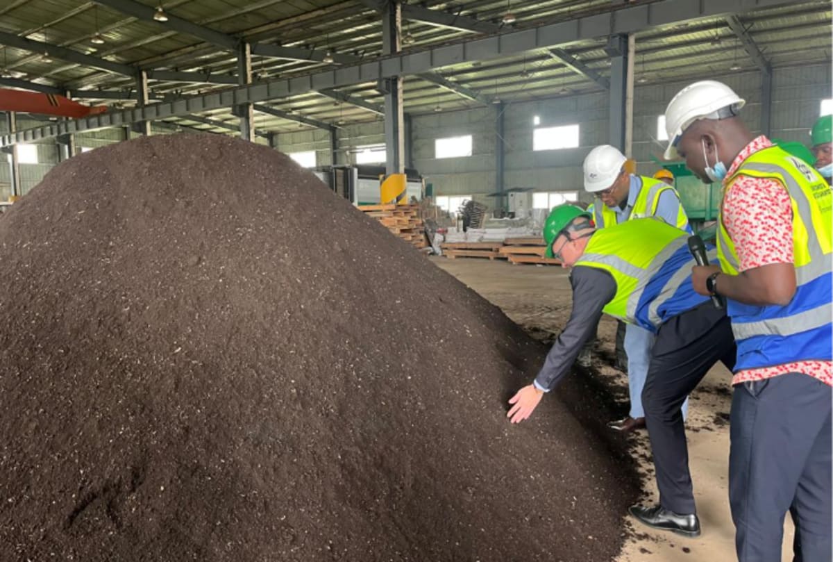 Workers sorting recyclable materials at Kumasi Composting and Recycling Plant in Ghana
