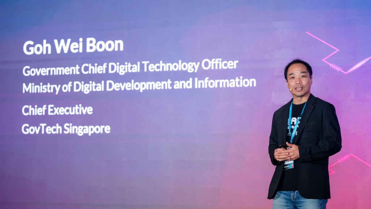 ** Singapore GovTech Chief Executive Goh Wei Boon speaking at STACKx Cybersecurity conference