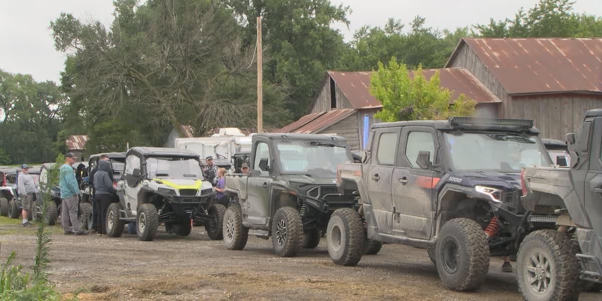 Teenage girl leading group of side-by-side vehicles during hospital fundraising ride in Iowa