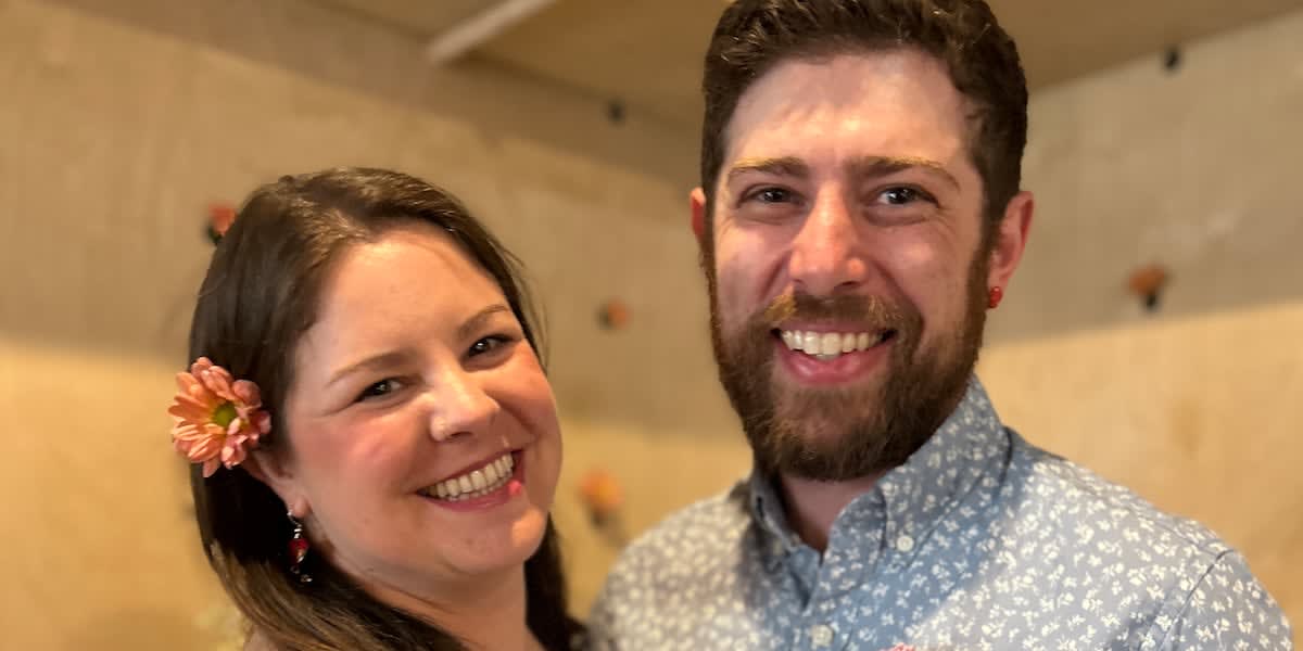 Grace Gillaspie and Cameron Plas smiling together after their surprise Kansas City wedding