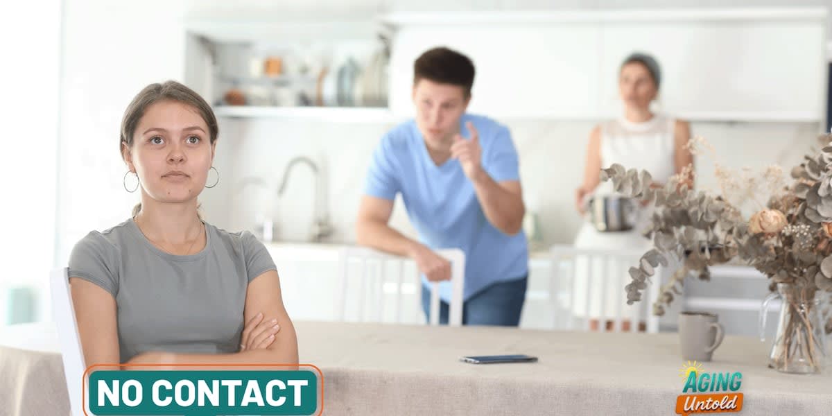 Grandmother and grandchildren smiling together outside their home at Pemberton Park housing complex