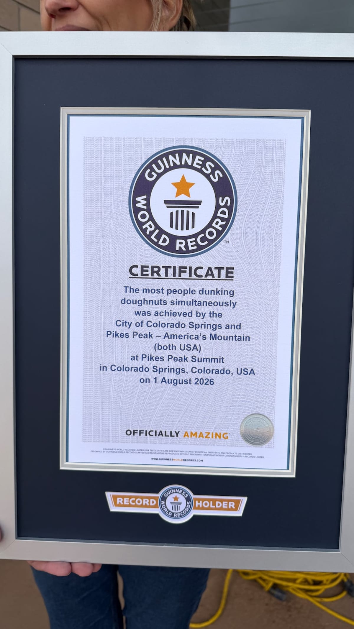 285 People Set Doughnut Dunking Record on Pikes Peak - Image 2