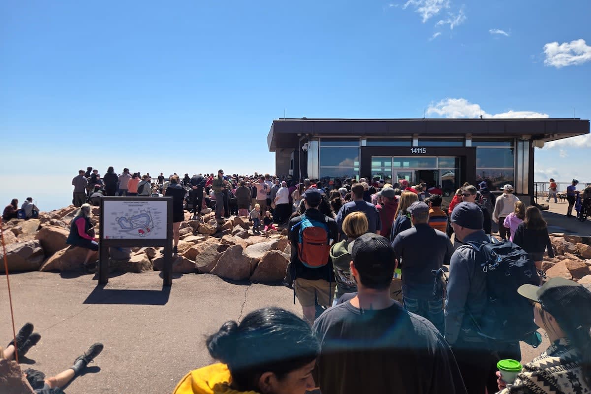 285 People Set Doughnut Dunking Record on Pikes Peak - Image 3