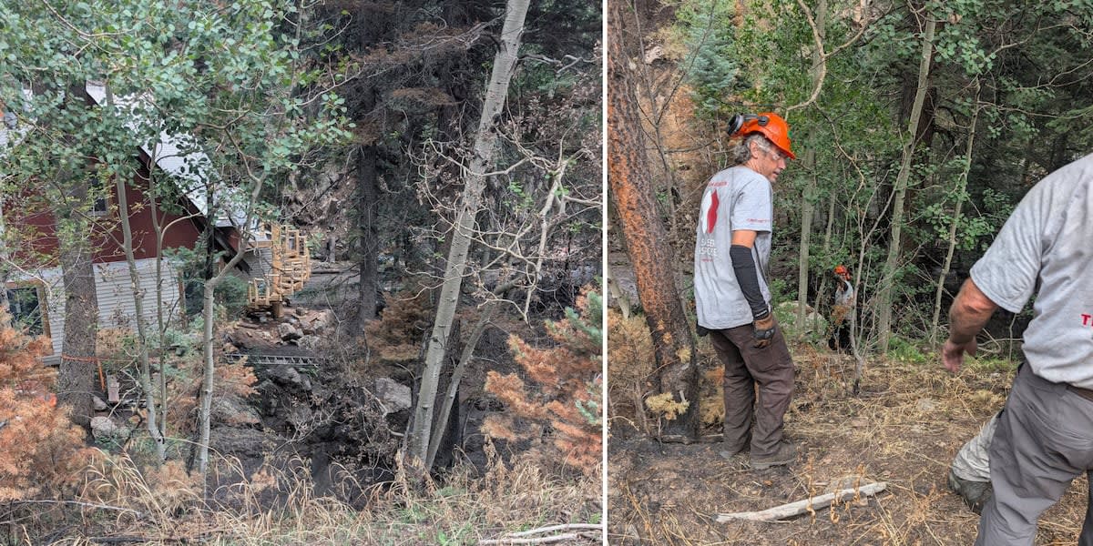 Volunteers clearing fallen logs and debris from creek near residential home in Colorado