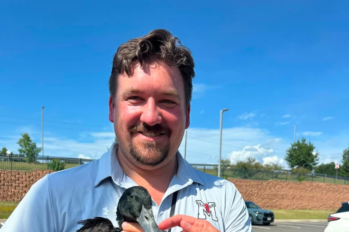 Marshall Firefighters Rescue School Duck from Storm Drain - Image 5