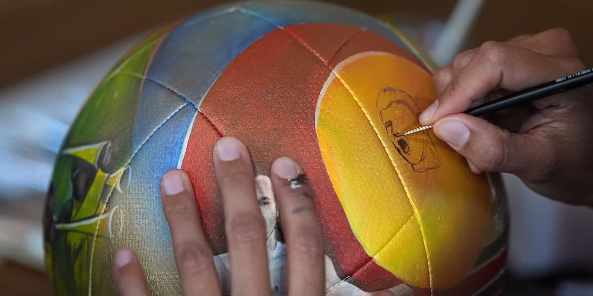 Artist Turns Soccer Balls Into World Cup Masterpieces