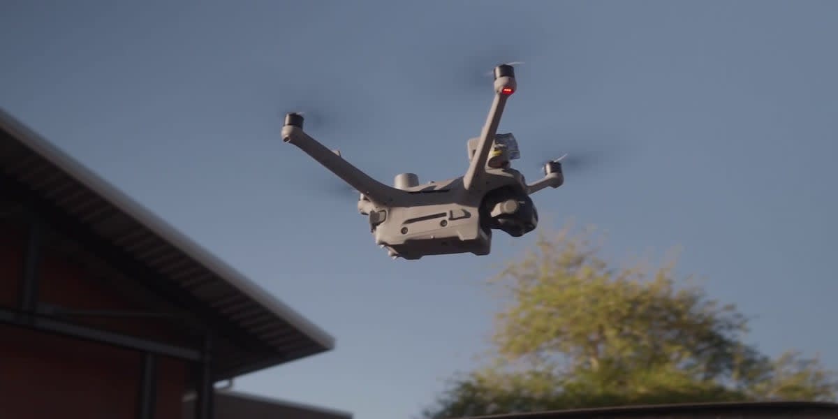 Rescue drone with thermal camera hovers during emergency training demonstration in Arizona