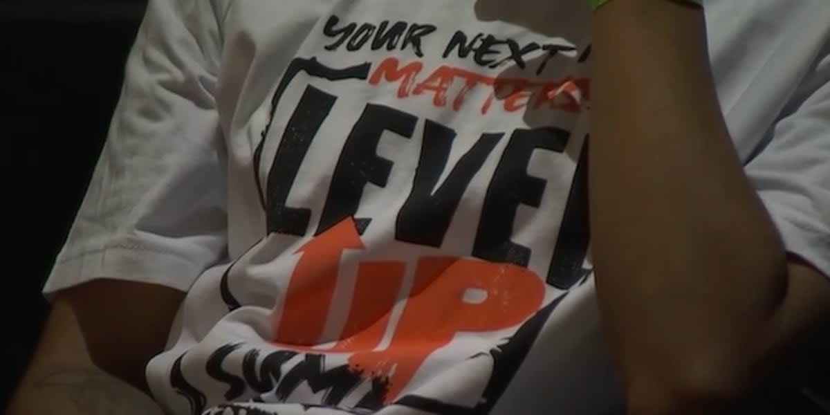 Teens listening to survivor testimony at Clark County Level Up Summit event