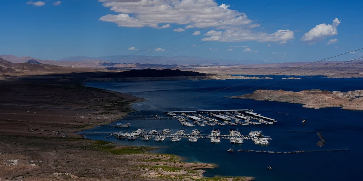 Las Vegas police helicopter conducting nighttime rescue operation over Colorado River near Laughlin