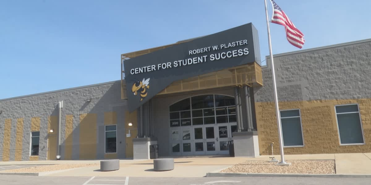 Students walking through bright modern hallway of renovated Lebanon Missouri mall turned education center
