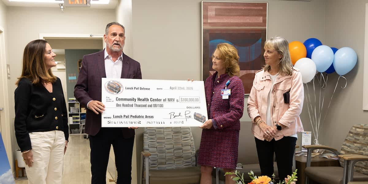 Bud Foster at community event supporting pediatric healthcare center in Christiansburg, Virginia