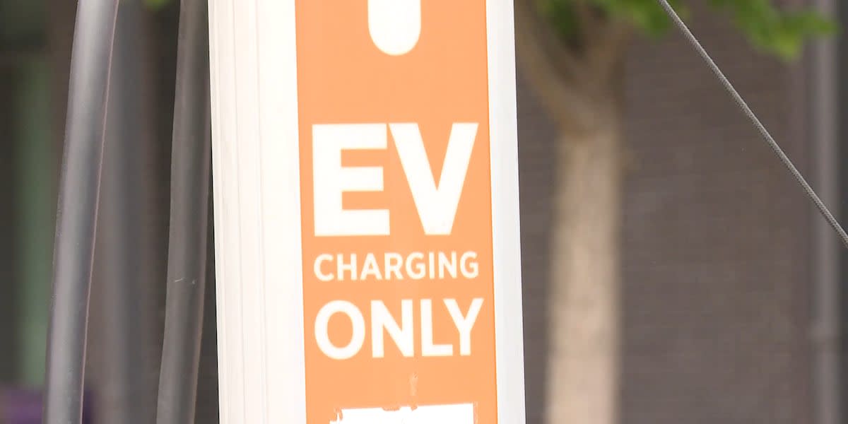 Electric vehicle plugged in and charging at home in North Carolina driveway