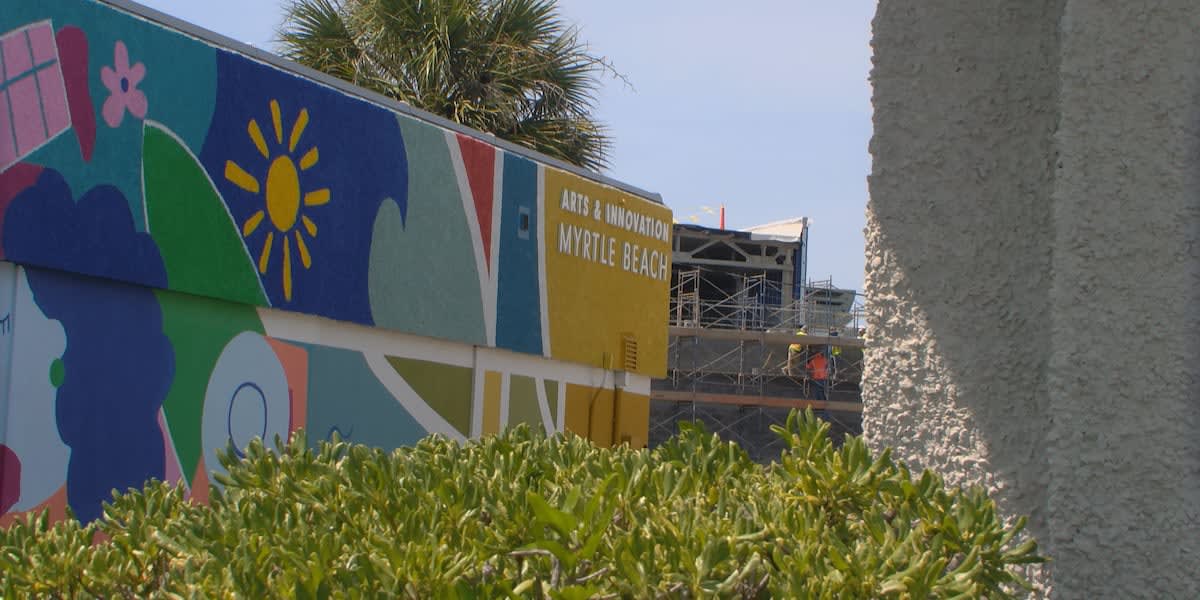 Modern office building in Myrtle Beach Arts and Innovation District with construction activity nearby