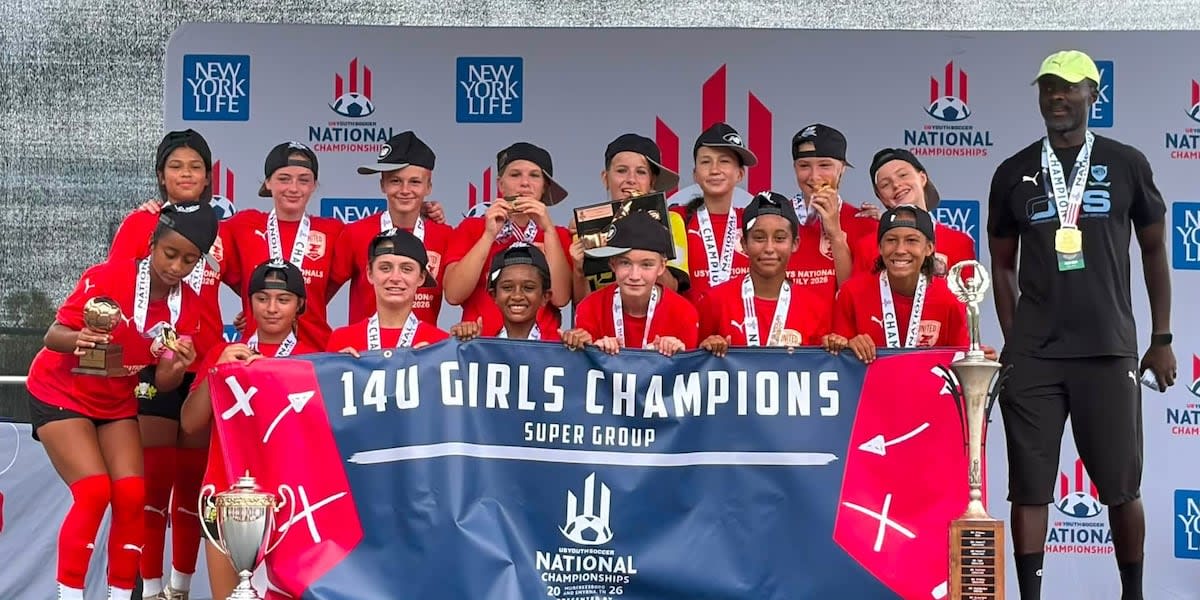 Fort Wayne United FC girls soccer team celebrating their historic national championship victory