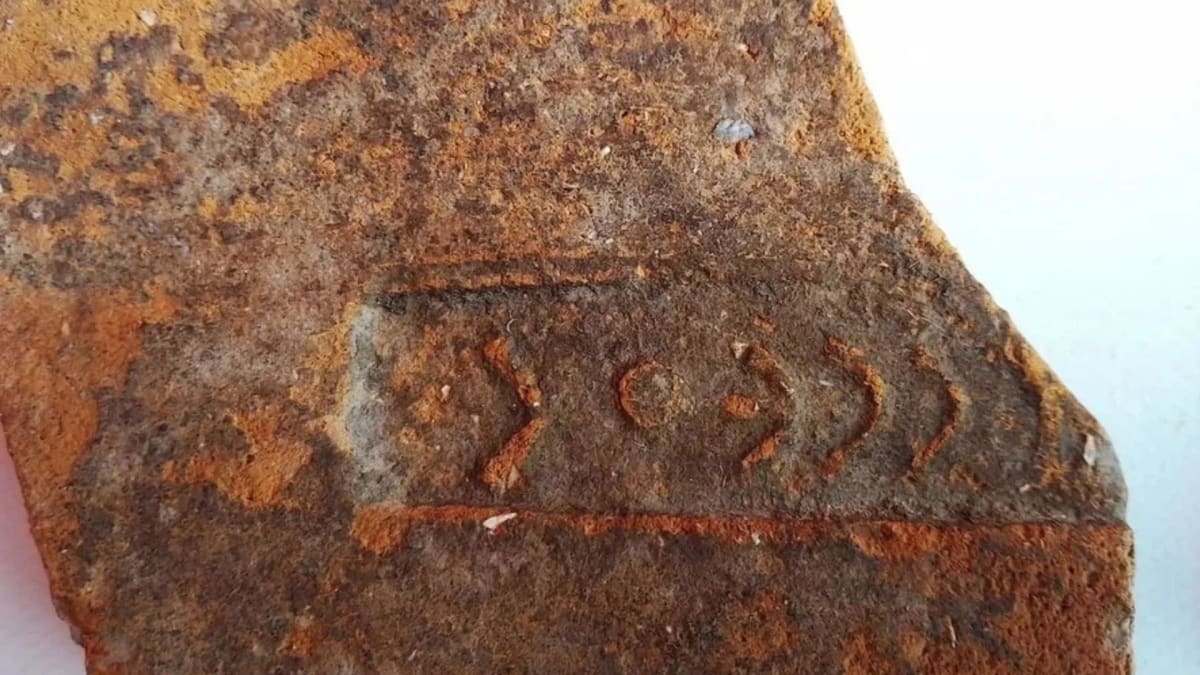 Ancient Greek archaeological site on hillside overlooking Mediterranean Sea on Ithaca island