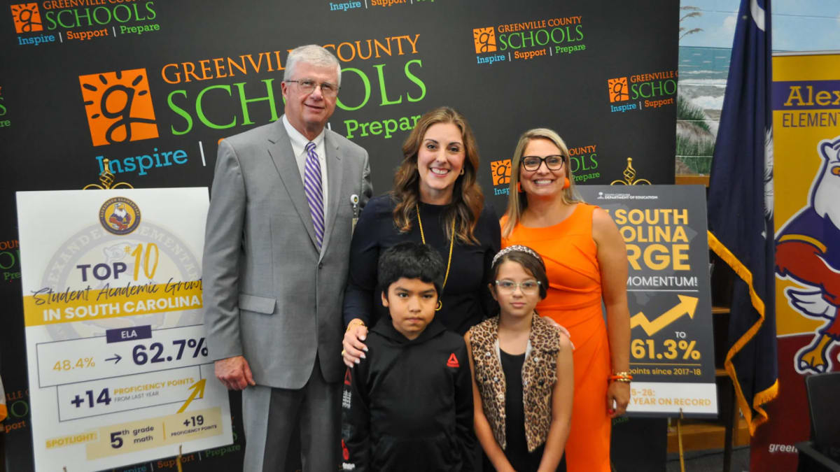 Students and teachers celebrating inside Alexander Elementary School in Greenville, South Carolina
