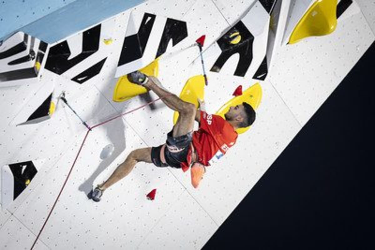 Alberto Ginés López celebrates emotional World Cup climbing gold medal victory in Chamonix France