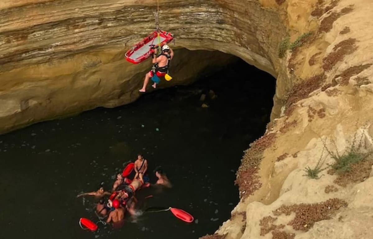 Coast Guard Fireman Saves Unconscious Cliff Diver