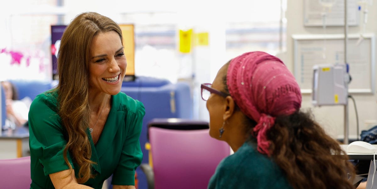 Princess Catherine speaking with cancer survivor Hasna during hospital visit, holding hands