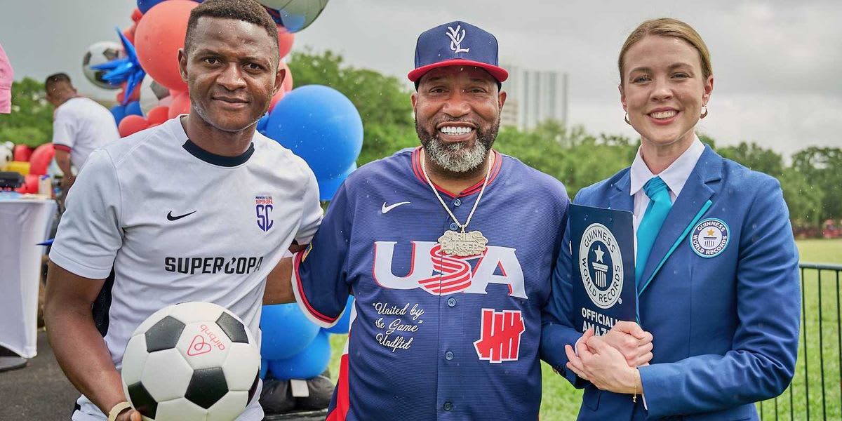 Soccer balls lined up in Hermann Park with DaMarcus Beasley and Bun B during Guinness World Record attempt