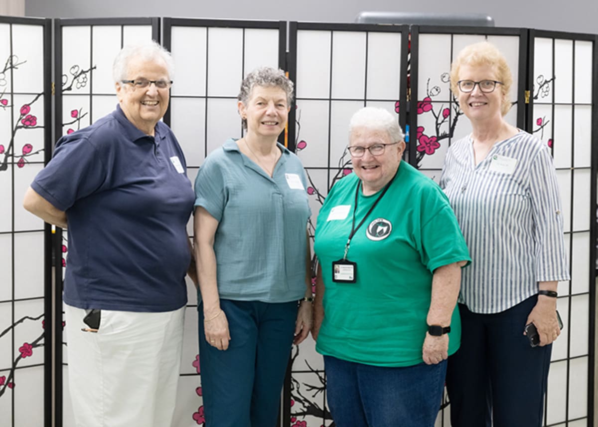 Community members gather outdoors at Dominican Sisters of Hope reunion celebration in Newburgh