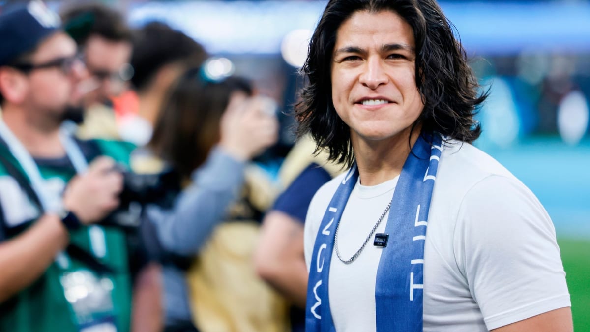 Cristo Fernandez in El Paso Locomotive FC uniform smiling on soccer field