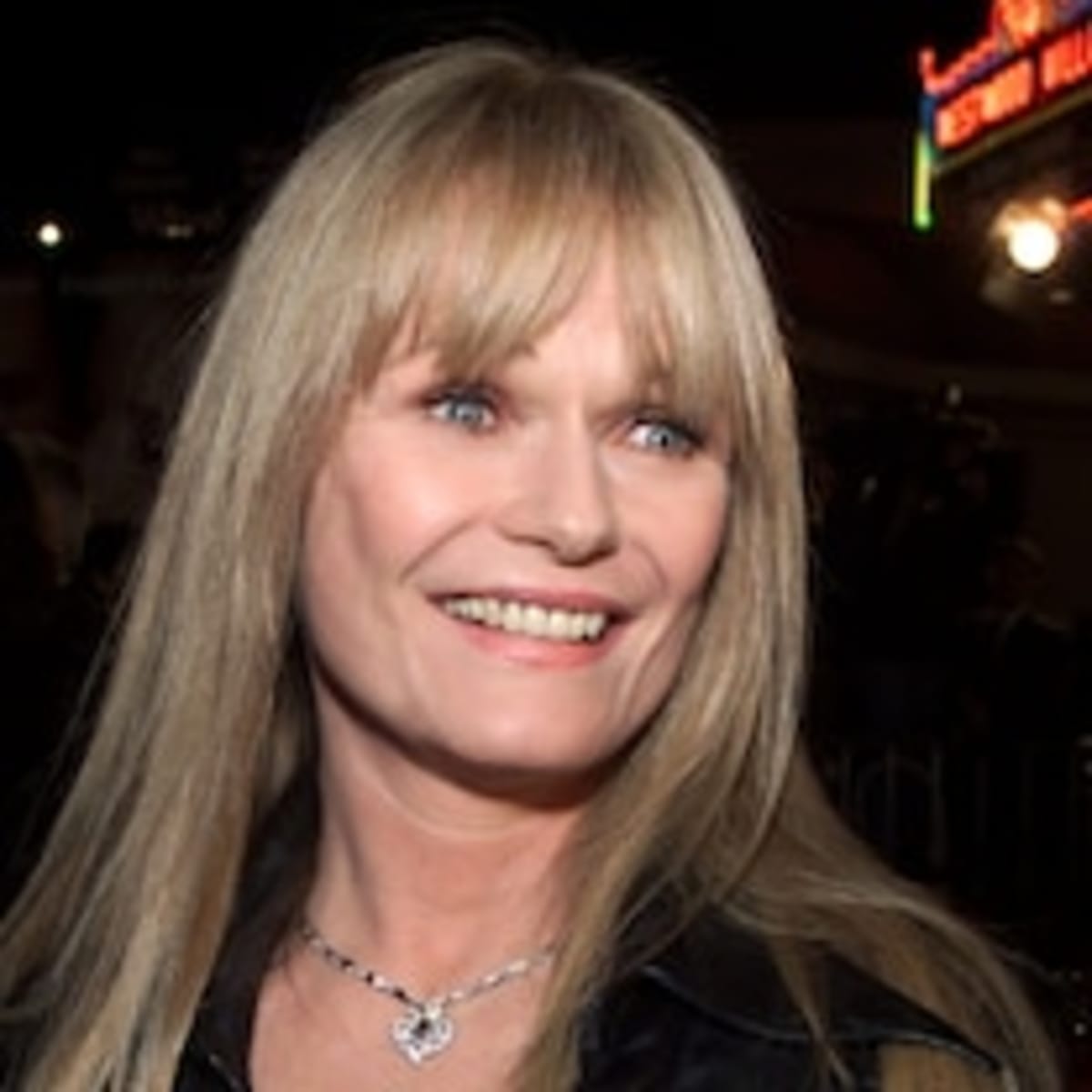 Surf coach Lucas Taub diving into ocean water to rescue father and daughter from rip current