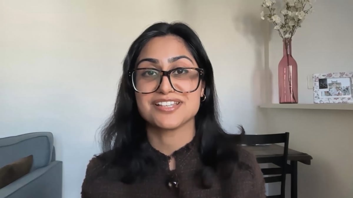 Young woman Mrinali Dhembla smiling after beating Stage 3 cancer with new immunotherapy treatment