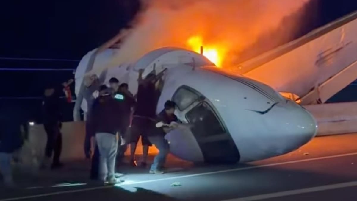 Volunteers and first responders working together at nighttime plane crash scene on Texas highway