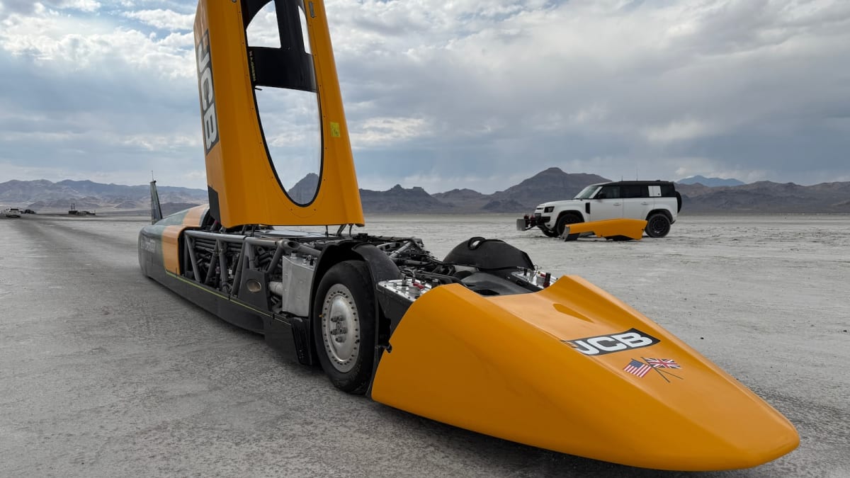 Sleek hydrogen-powered race car speeding across white salt flats in Utah desert