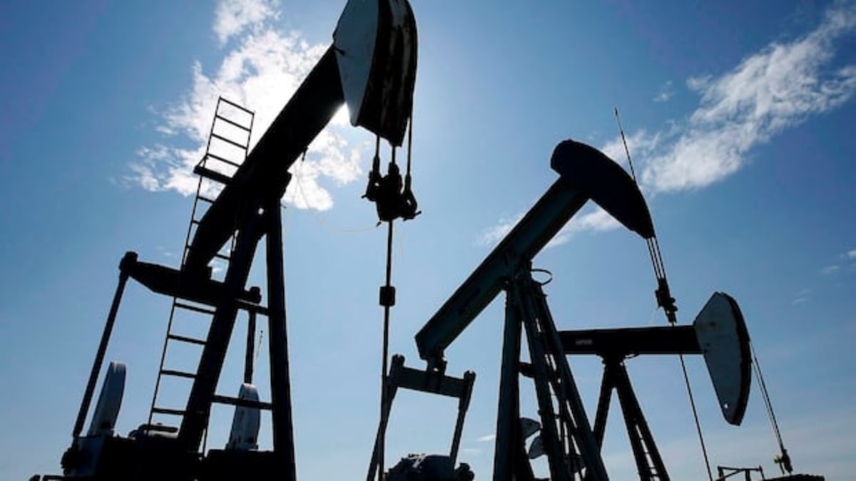 Oil pumpjacks extracting crude near Halkirk, Alberta under clear blue sky
