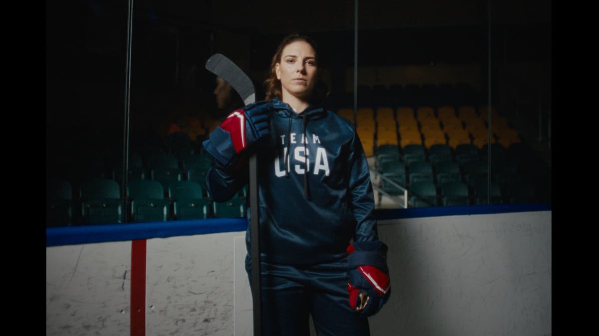 Olympic hockey champion Hilary Knight celebrating gold medal victory with Team USA at Milan Games