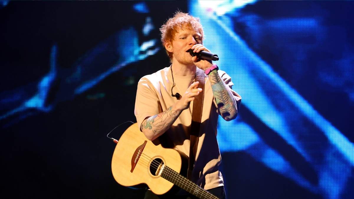 Ed Sheeran and Martin Garrix performing together at surprise wedding reception appearance