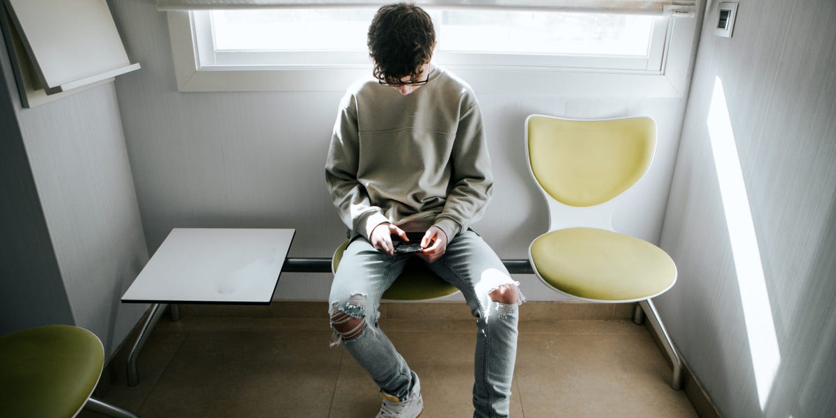 Teenager in casual clothes standing confidently outdoors representing growing independence and autonomy