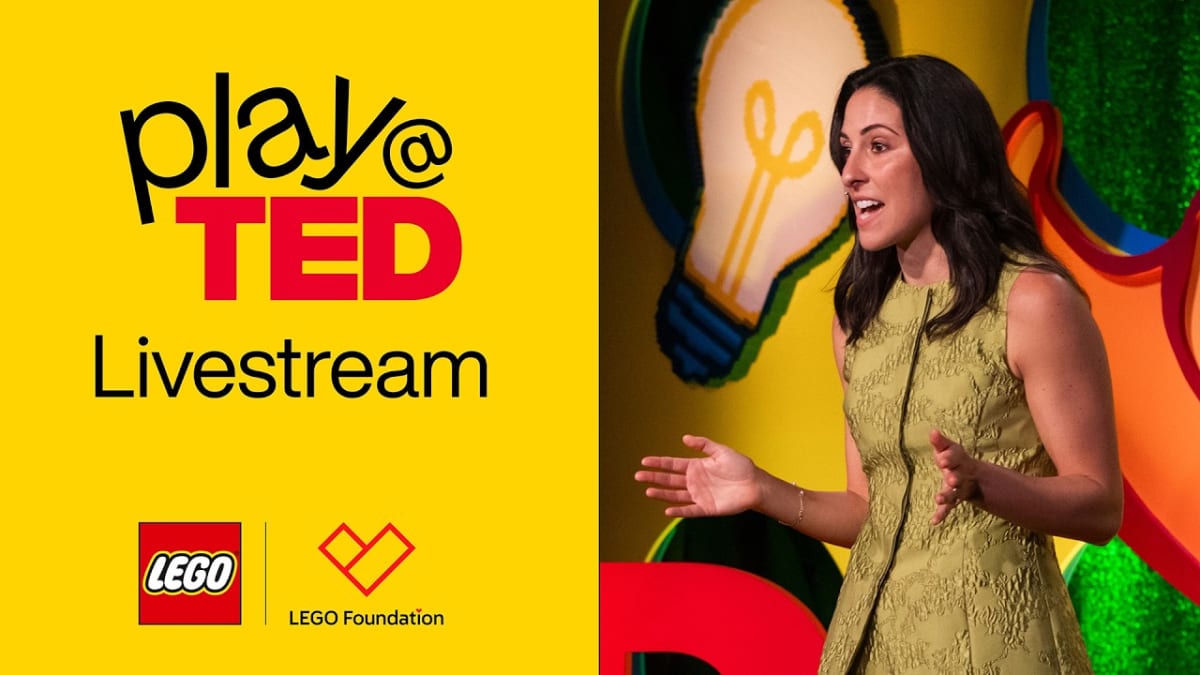 ** Colorful LEGO bricks arranged creatively on stage at TED Talk event celebrating play