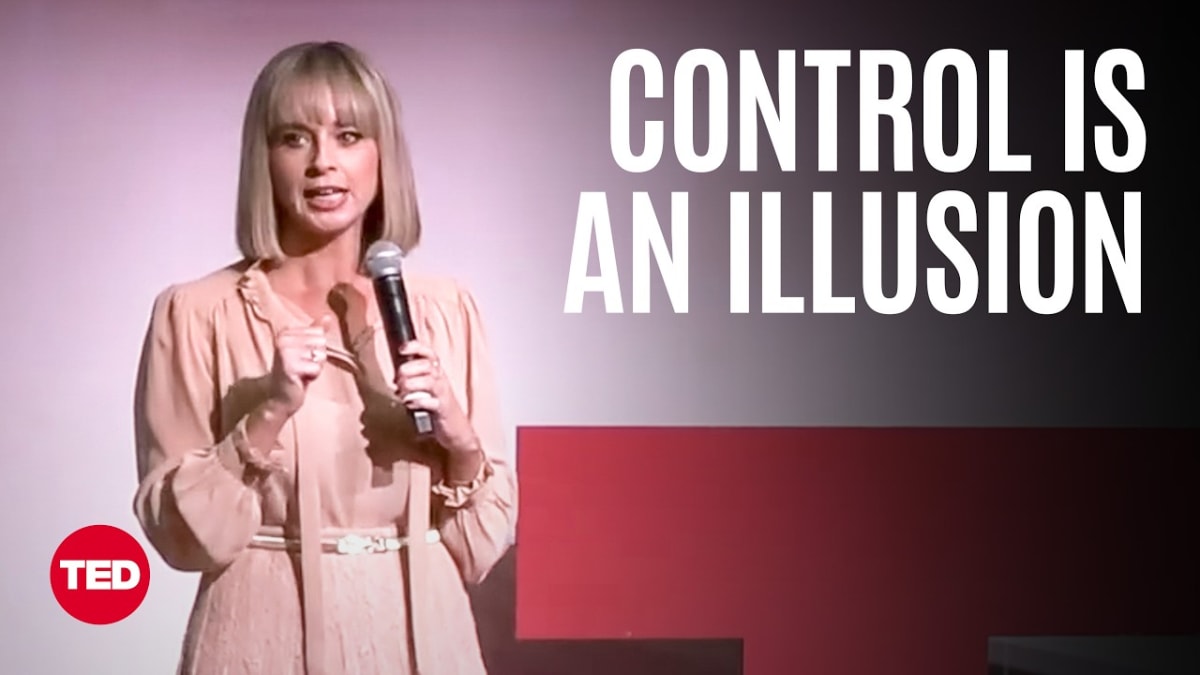 Jessica Kriegel speaking on red TED stage about leadership and workplace culture