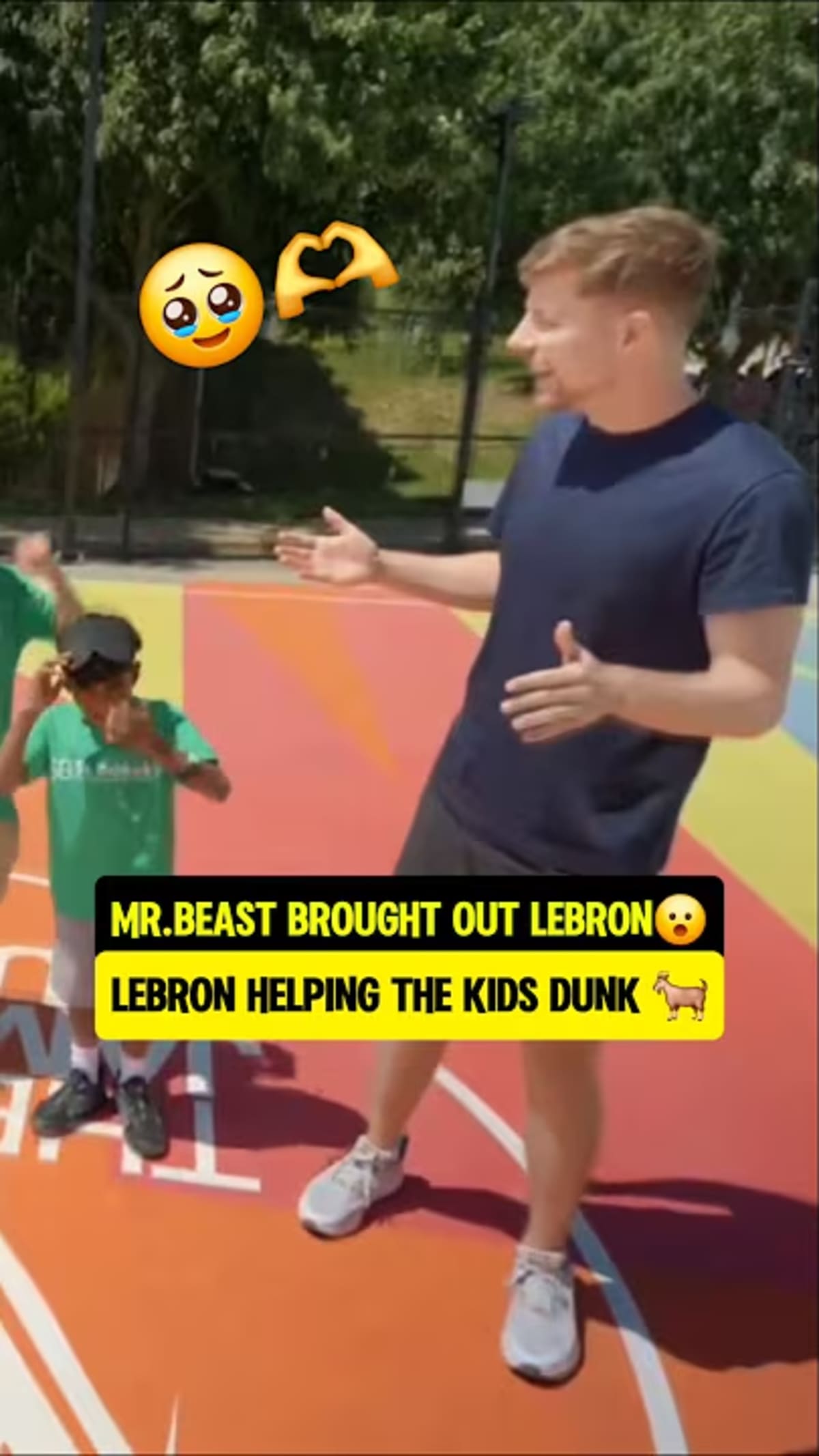 ** MrBeast and LeBron James standing together surrounded by excited children during surprise visit