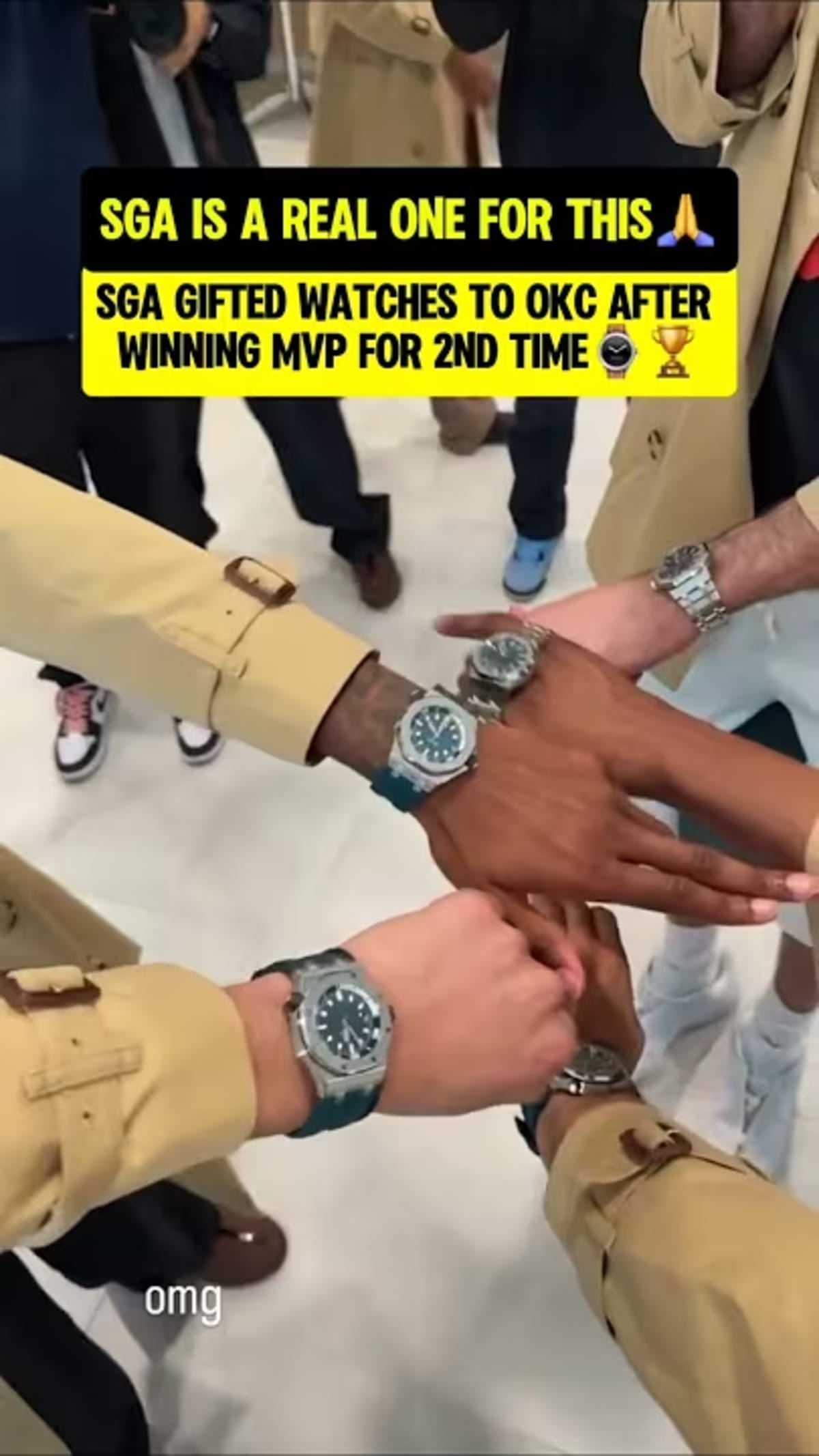 ** Shai Gilgeous-Alexander smiling with Oklahoma City Thunder teammates holding gift boxes with watches