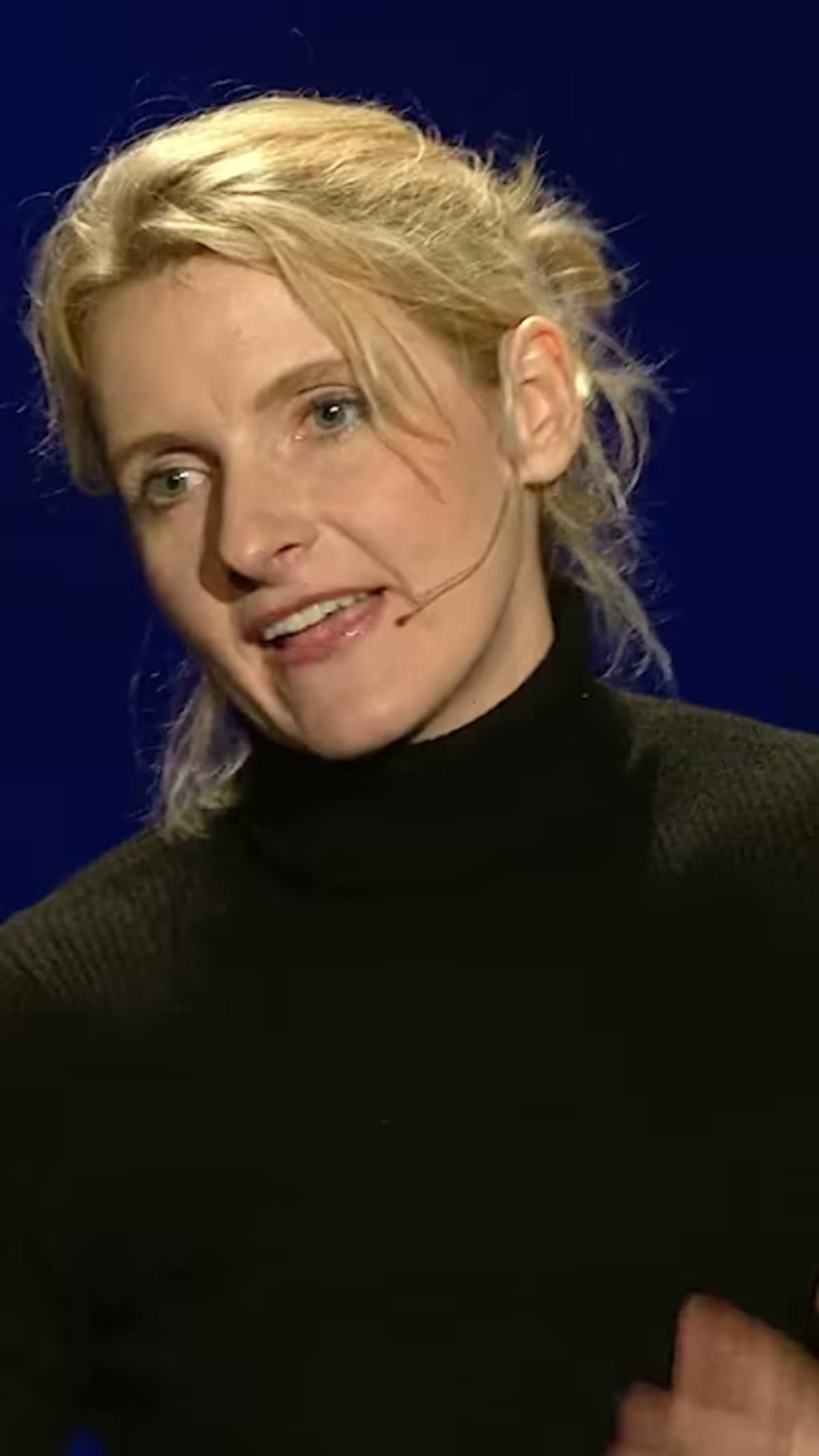 ** Elizabeth Gilbert speaking on TED stage about creativity and handling success and failure